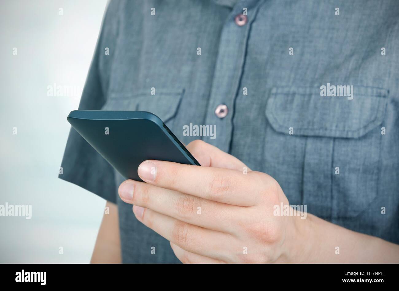 Man using smartphone. Close up of unrecognizable person Stock Photo
