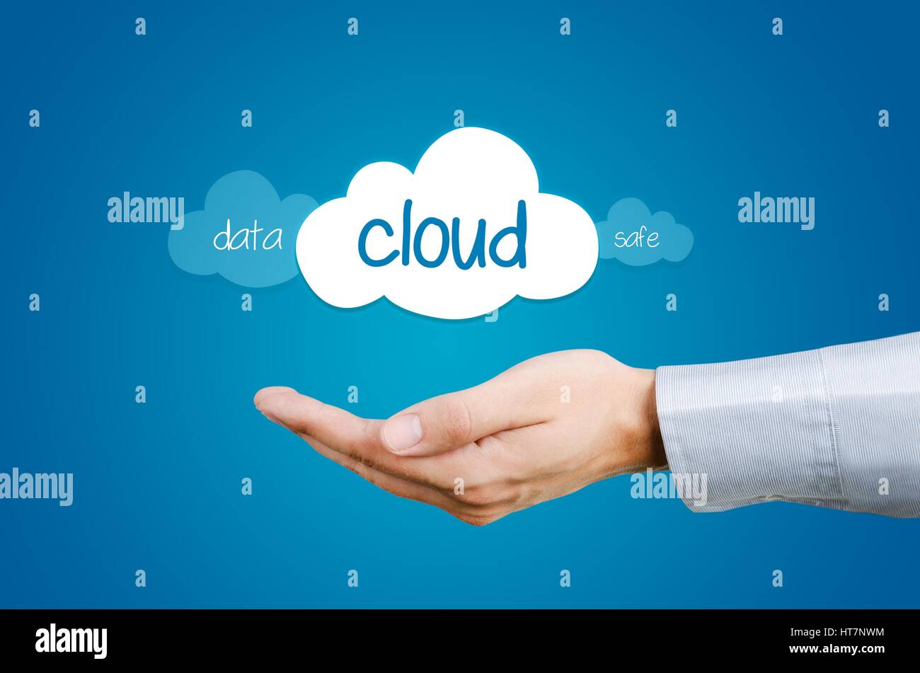 Cloud computing composition - hand and clouds with data and safe words Stock Photo