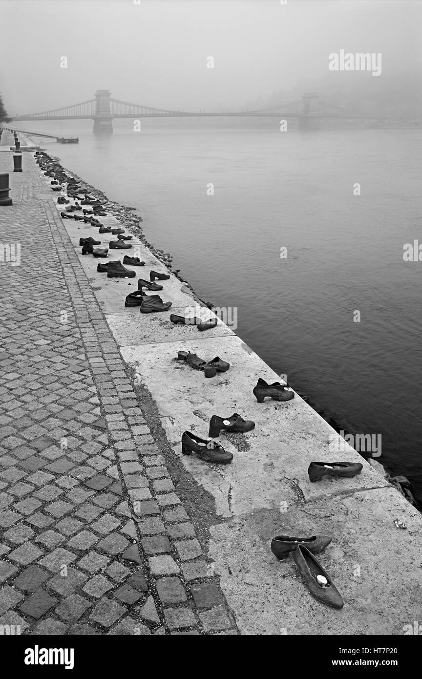 The 'Shoes on the Danube bank' memorial on the side of Pest, Budapest, Hungary. Stock Photo
