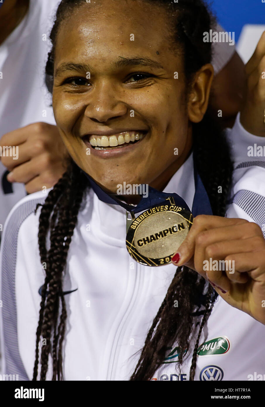 Washington, USA. 7th Mar, 2017. French Women's National Team Defender #3 Wendie Renard shows off her medal after a soccer match as part of the SheBelieve Cup 2017 between the United States and France at RFK Stadium in Washington DC. France defeats the United States, 3-0, to win the SheBelieve Cup. Credit: Cal Sport Media/Alamy Live News Stock Photo