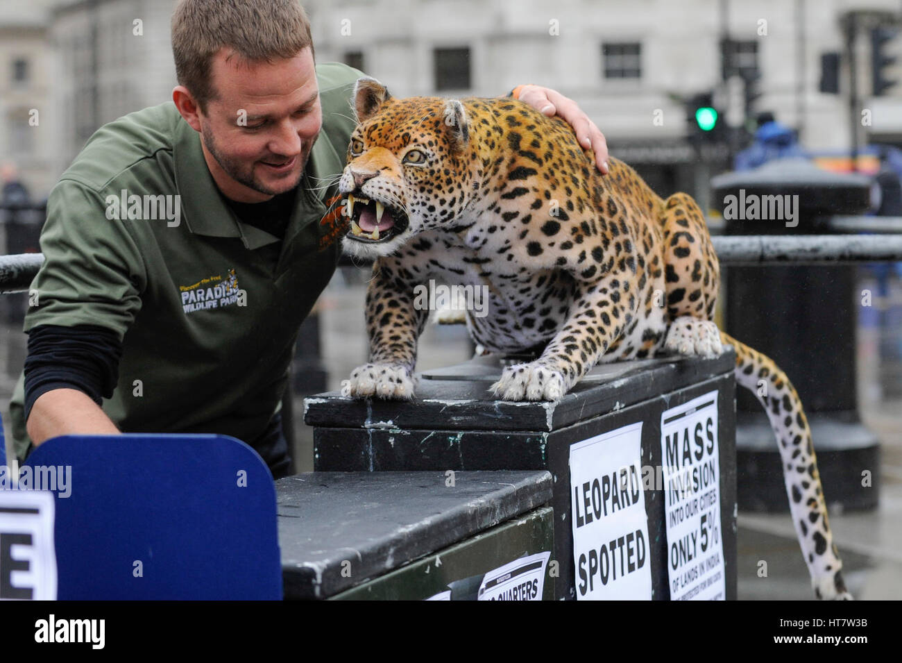 London, UK. 8th Mar, 2017. Giles Clark, Managing Director of The Big Cat Sanctuary, poses with an animatronic leopard in Trafalgar Square as Nat Geo WILD unveils the world's first hyper realistic animatronic leopard to mark the launch of Big Cat Week (6-12 March), in association with charity the Big Cats Initiative. Credit: Stephen Chung/Alamy Live News Stock Photo