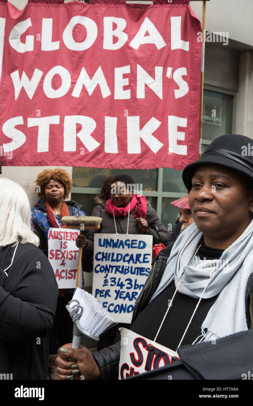 London, UK. 8th Mar, 2017. Women from Global Women's Strike and Women's Strike UK protest for the world's mothers and children outside the Central Family Court in Holborn on International Women's Day and as part of an International Women's Strike. Some women hold brooms, adopted as a symbol by women in the UK on the basis that brooms are strong when all strands work together. Credit: Mark Kerrison/Alamy Live News Stock Photo