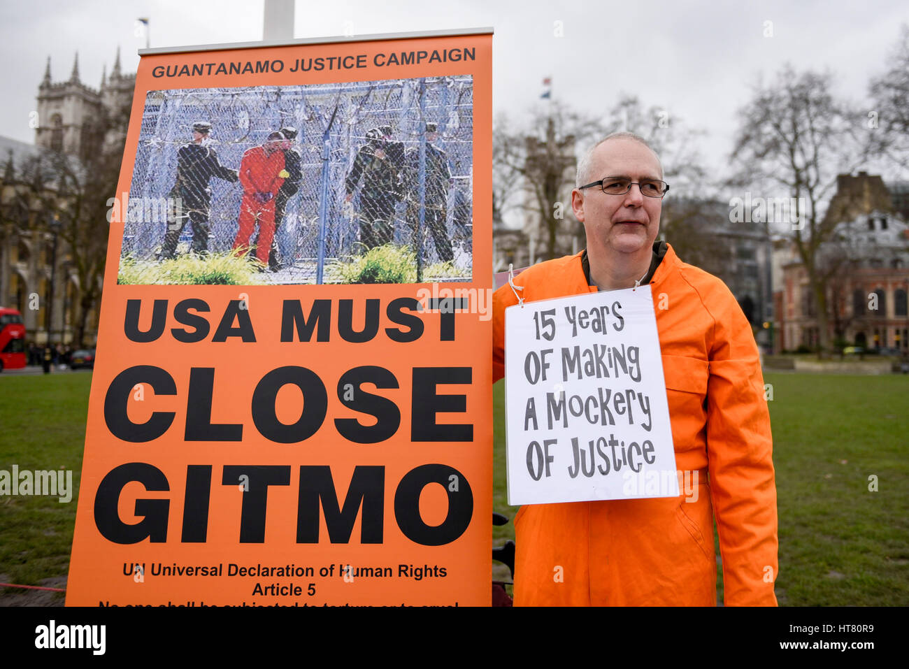 London, UK.  8 March 2017.  Members of Guantanamo Justice Campaign stage a protest in Parliament Square opposite the Houses of Parliament demanding that Donald Trump, President of the United States, close Guantanamo Bay concentration camp and calling on Theresa May, Prime Minister, to seek representations from President Trump that it will be a closure, not a relocation to a mainland US prison.  Credit: Stephen Chung / Alamy Live News Stock Photo