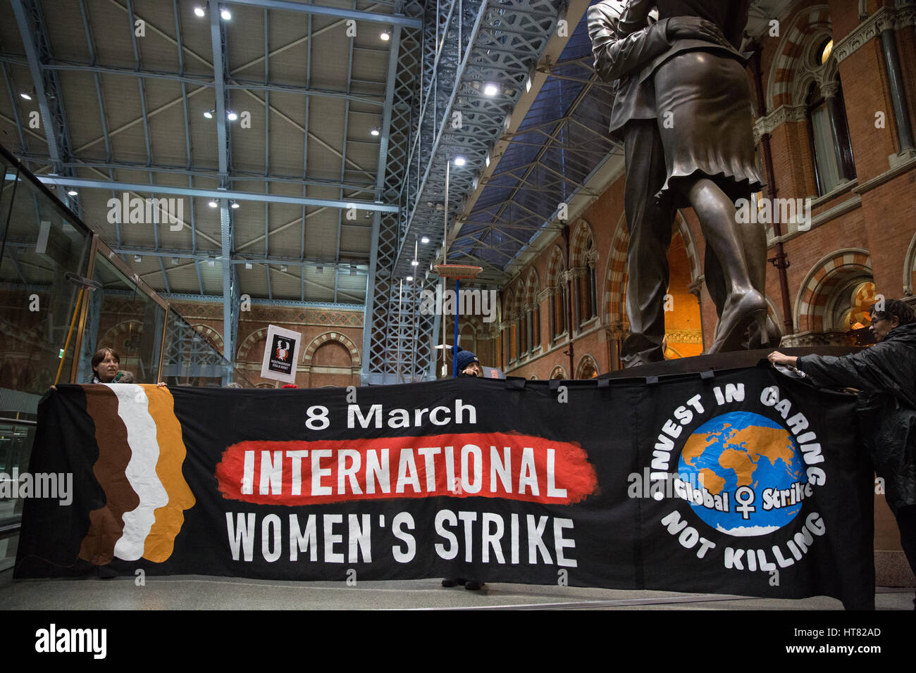 London, UK. 8th March, 2017. Women from Global Women's Strike, Women's Strike UK and Polish feminists stage  performance art at St Pancras station to coincide with International Women's Day and the International Women's Strike. Credit: Mark Kerrison/Alamy Live News Stock Photo
