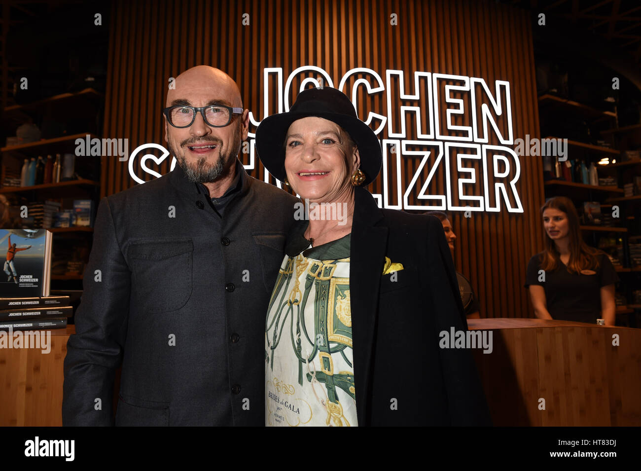 Taufkirchen, Germany. 08th Mar, 2017. Entrepreneur Jochen Schweizer and designer Barbara Engel at the so-called red carpet opening of a theme park at the Jochen Schweizer Arena in Taufkirchen, Germany, 08 March 2017. Photo: Felix Hörhager/dpa/Alamy Live News Stock Photo