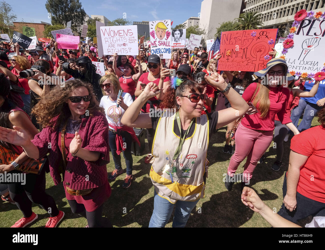 Woman's Day Rally Los Angeles, California, USA. 8th Mar, 2017. Participants carry signs ...