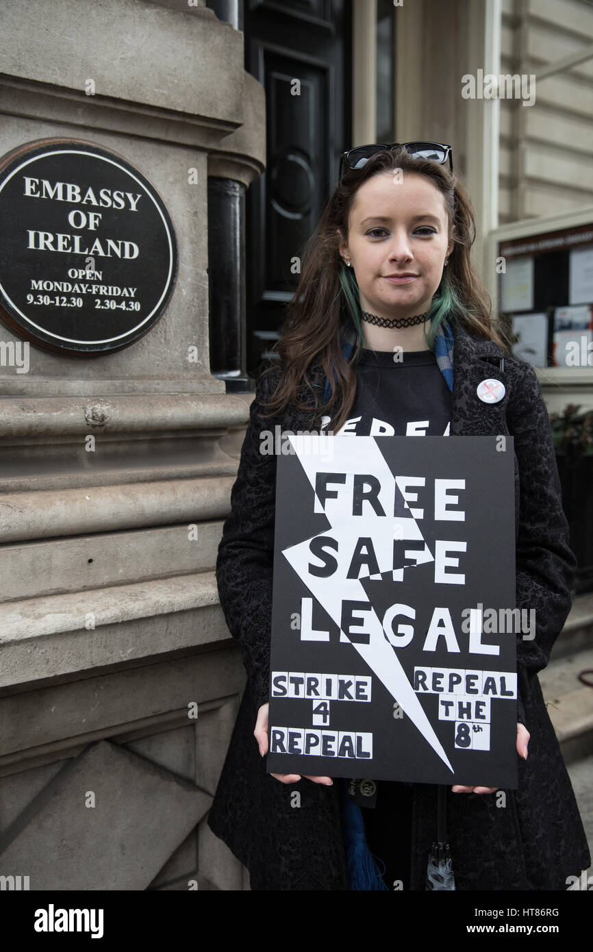 London, UK. 8th Mar, 2017. An activist from the London-Irish Abortion Rights Campaign protests outside the Irish embassy on International Women's Day to demand that the Irish government call a referendum to repeal the 8th Amendment by the 8th of March, failing which a strike will be called, and in solidarity with the 11 women per day who travel from Ireland to Britain for abortions. Credit: Mark Kerrison/Alamy Live News Stock Photo