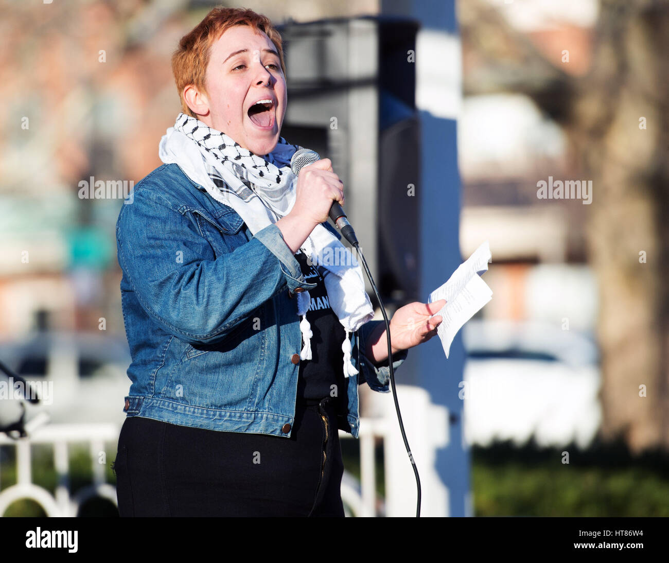 Columbus, USA. 08th Mar, 2017. Rachel Reiser of the International Socialist Organization addresses the Columbus crowd at the "A Day Without a Woman" Rally. Columbus, Ohio, USA. Credit: Brent Clark/Alamy Live News Stock Photo