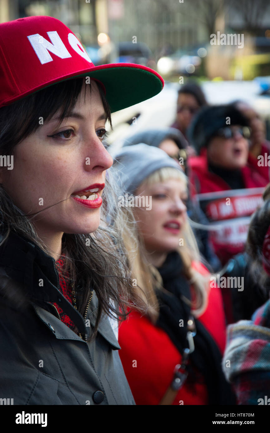 Women and individuals from throughout Pittsburgh, Pennsylvania, rallied in solidarity against patriarchy, racism, and capitalism in Downtown Pittsburgh in front of the City County Building. Stock Photo