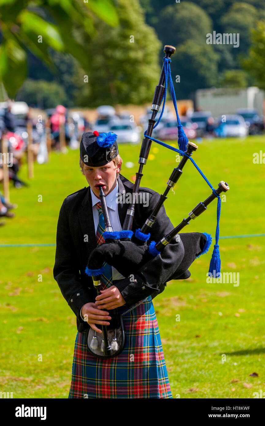 pipe player at the Kinloch Rannoch Highland games. At Kinloch Rannoch Scotland. Stock Photo