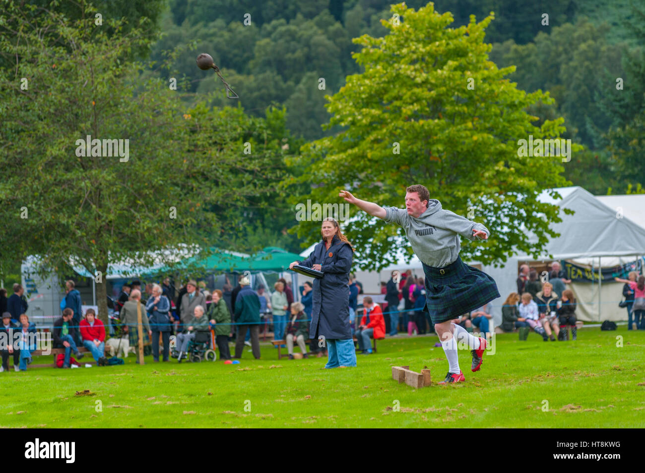 throwing the shot at the Kinloch Rannoch Highland games. At Kinloch Rannoch Scotland. Stock Photo