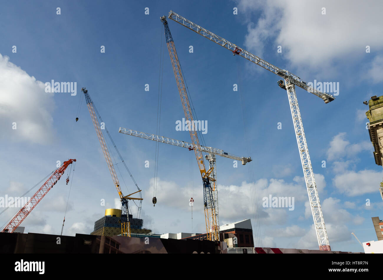 Several cranes in Birmingham skyline on the building development in Paradise Circus Stock Photo