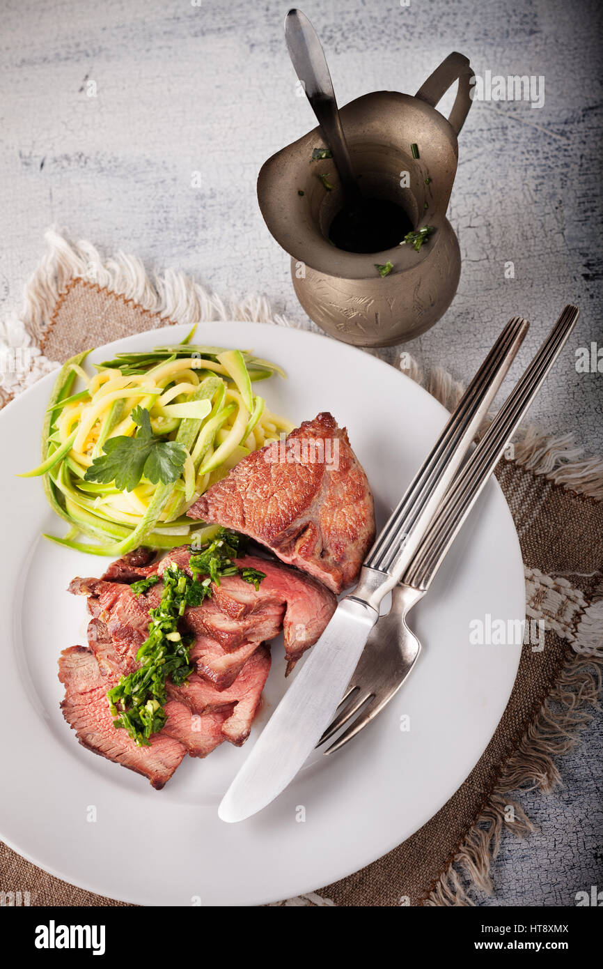 Zucchini pasta and meat Stock Photo