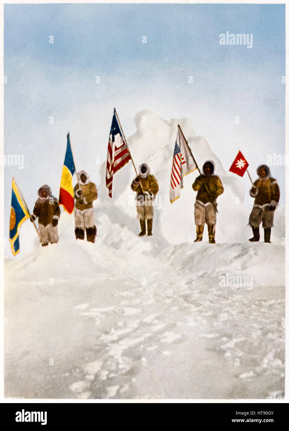 ‘The Five Flags at the Pole’ colorized photograph taken by American explorer Robert Peary (1856-1920) at what he believed to be the North Pole on 6th April 1909. Featuring Peary’s 5 assistants American Matthew Henson, and Inuits Ootah, Egigingwah, Seegloo and Ooqueah. Stock Photo