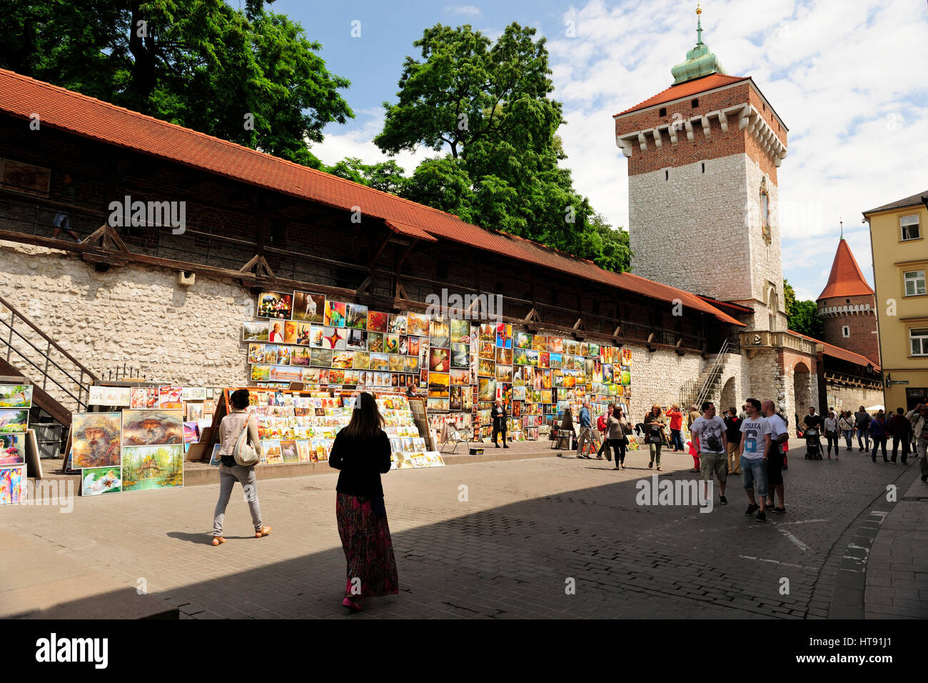 architecture, art, city, city walls, colorful, display, europe, florianska gate, in, paintings, poland, summer, touristic, tower, travel, unesco Stock Photo