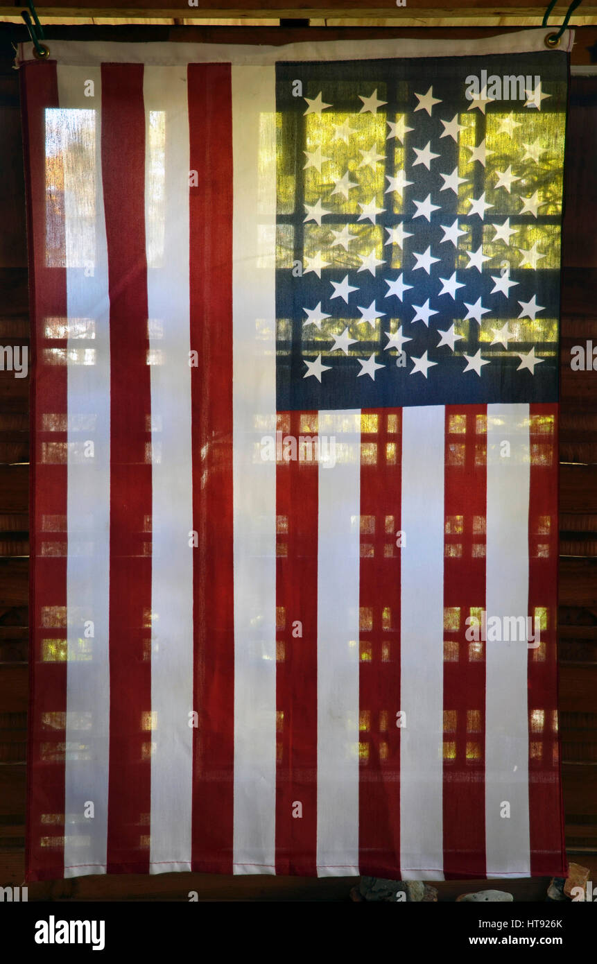 View of translucent American flag on back porch Stock Photo