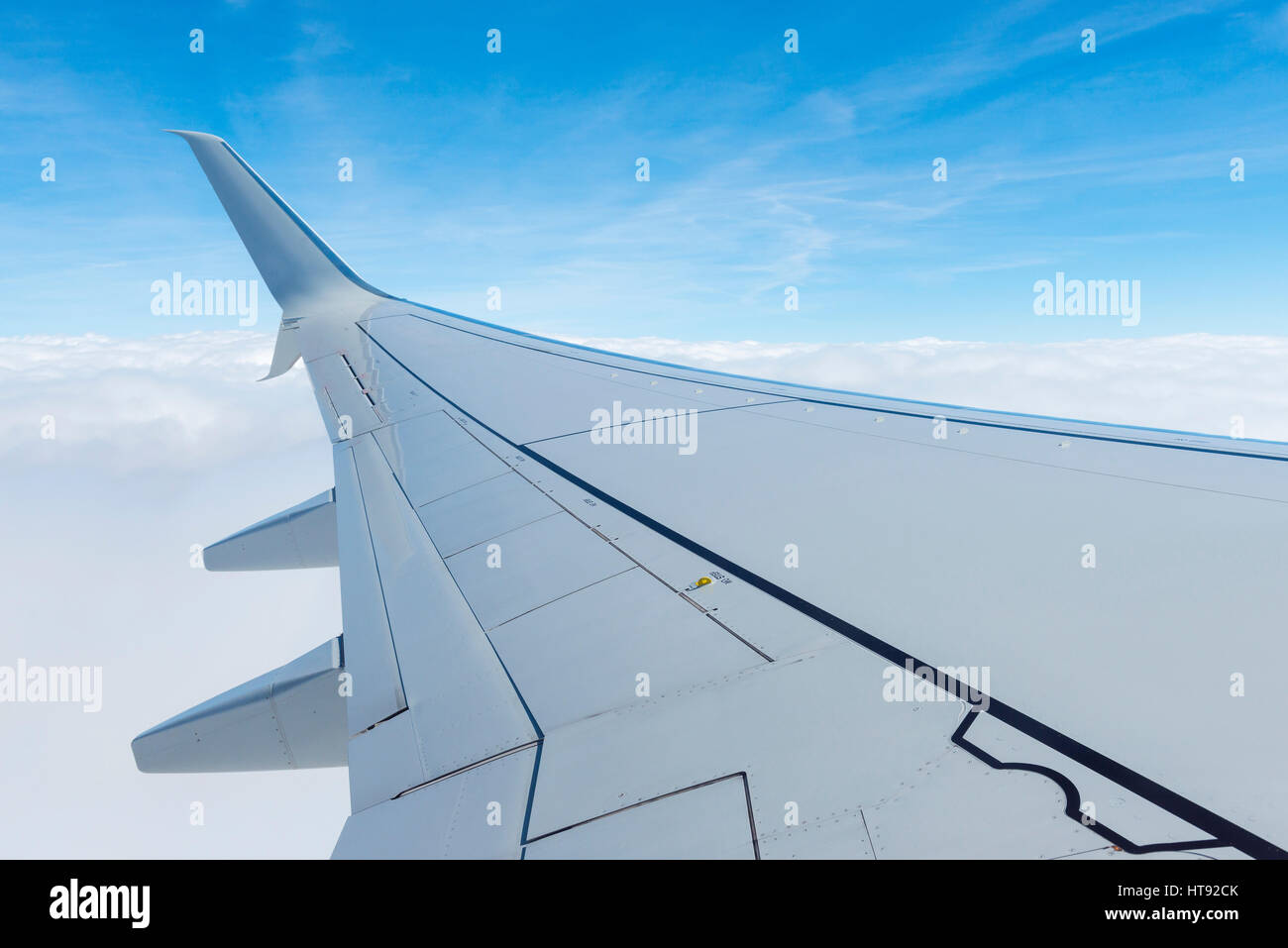 View of Wing from in Flight Airplane over Alps Stock Photo - Alamy