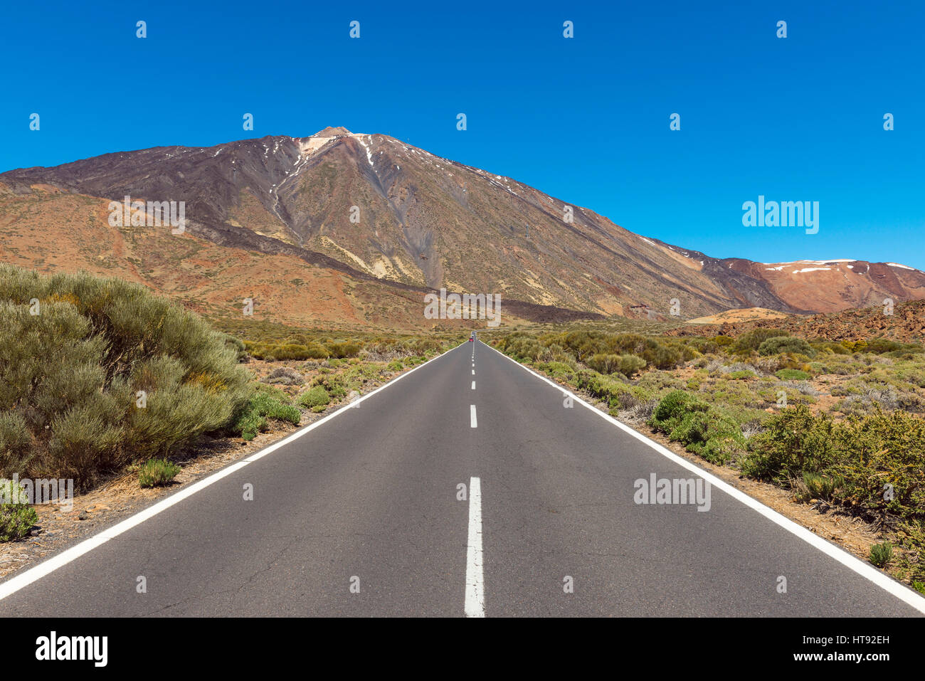 Road with Pico del Teide Mountain, Parque Nacional del Teide, Tenerife, Canary Islands, Spain Stock Photo