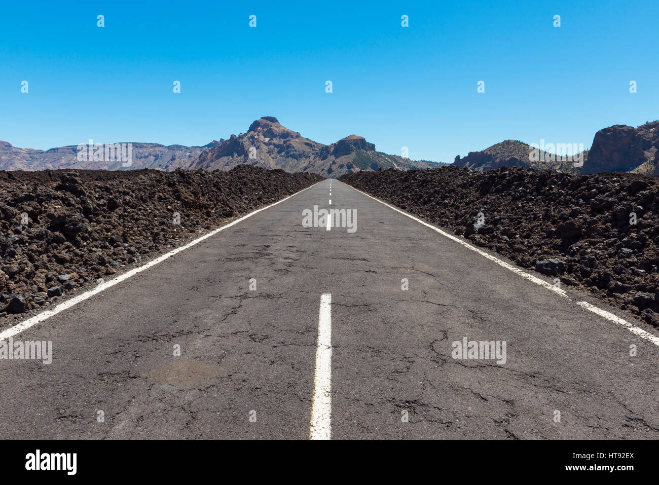 Road through Lava Field in Parque Nacional del Teide, Tenerife, Canary Islands, Spain Stock Photo