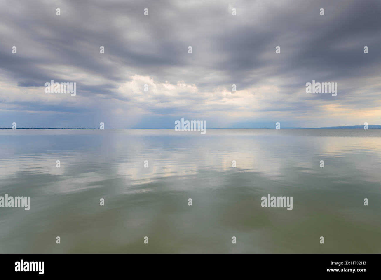 Still water reflecting clouds hi-res stock photography and images - Alamy