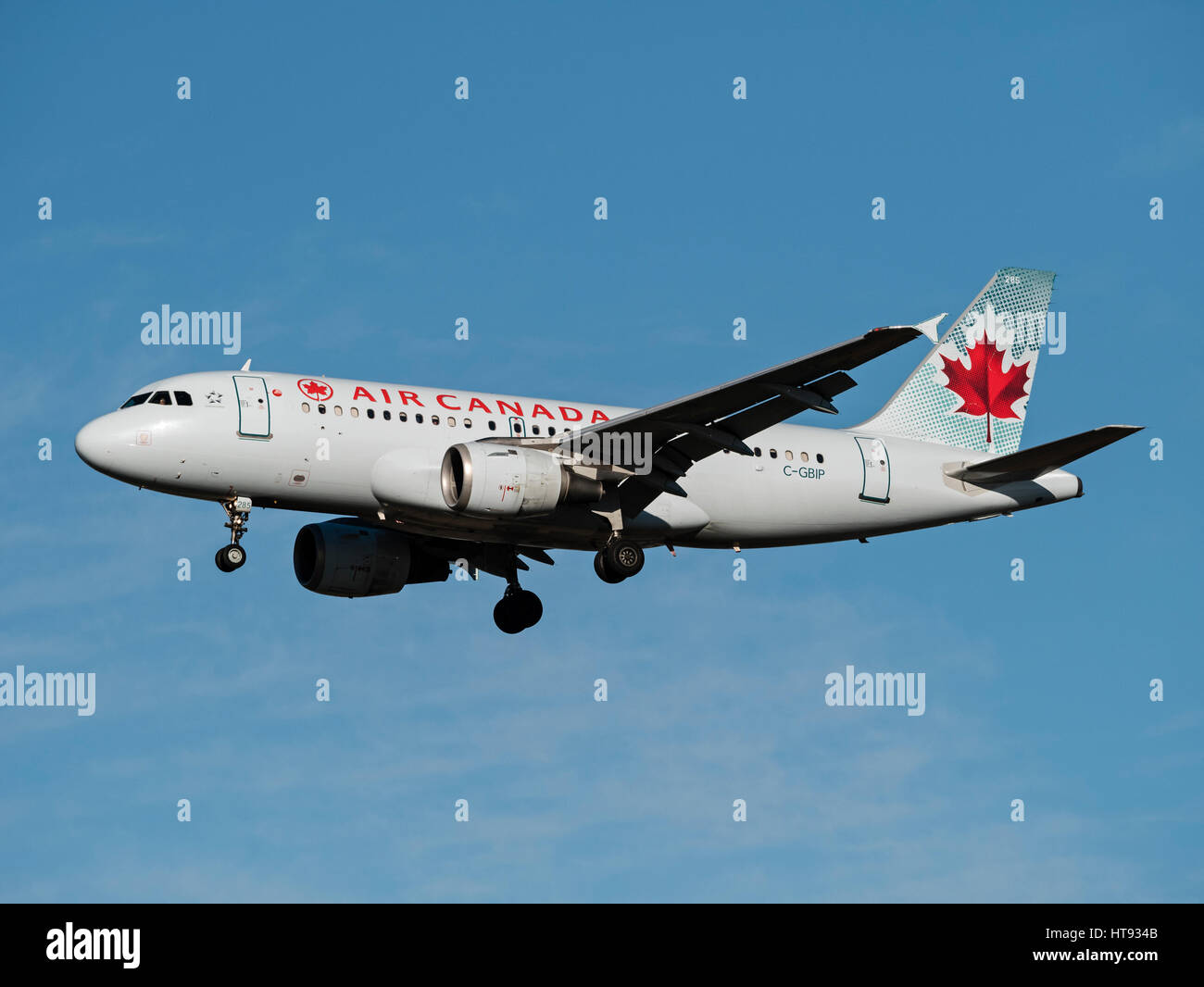 Air Canada plane Airbus A319 (C-GBIP) airborne final approach for landing Stock Photo