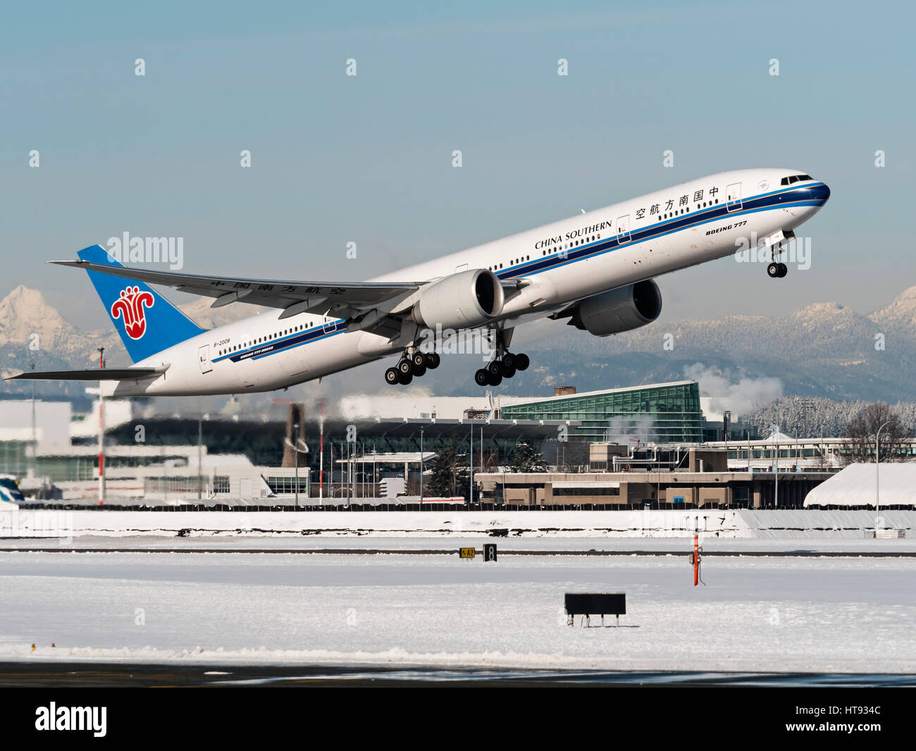 China Southern Airlines plane Boeing 777 (777-300ER) take taking off Vancouver International Airport Stock Photo