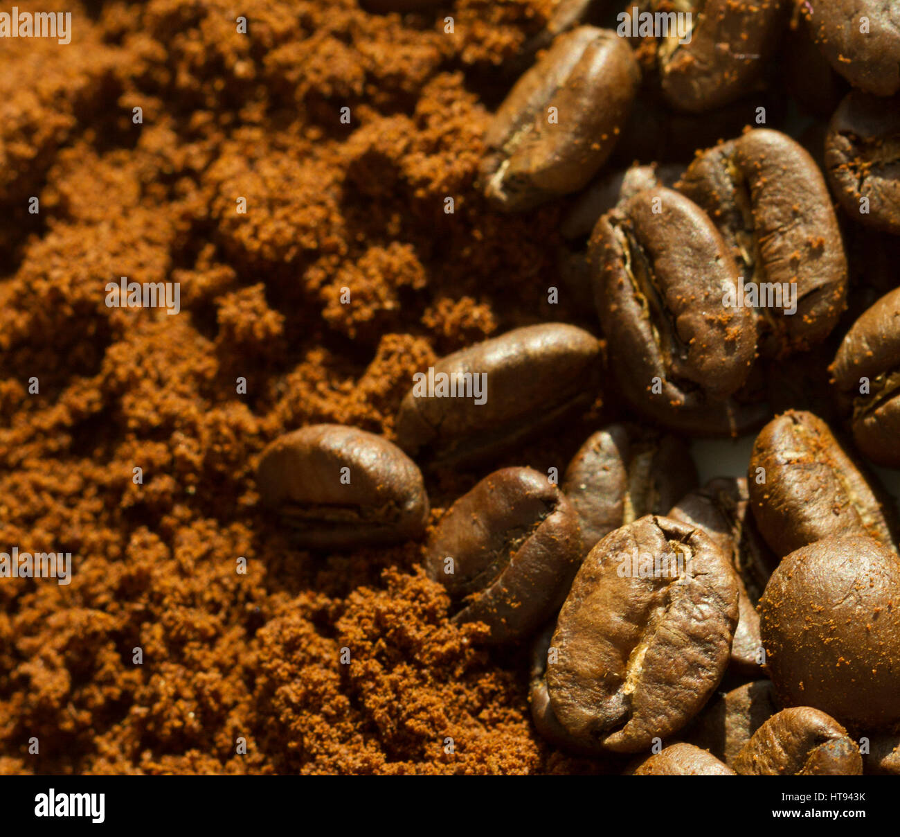 Coffee beans vs ground coffee Stock Photo Alamy