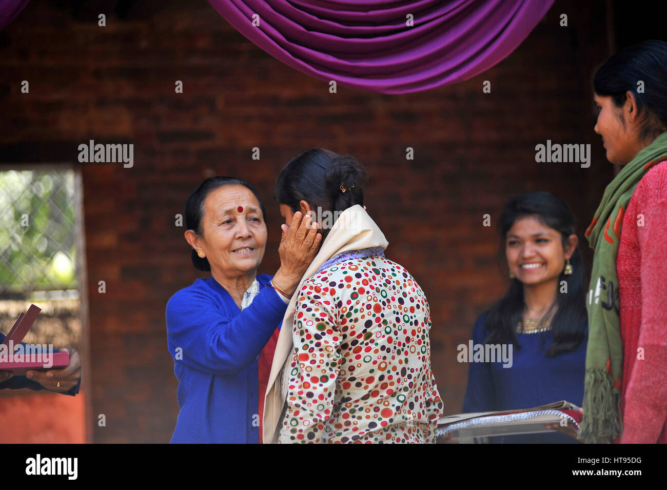 Kathmandu, Nepal. 08th Mar, 2017. Anuradha Koirala, the founder of Maiti Nepal honouring girls during Maiti Nepal felicitated nine female conductors of Mahanagar Yatayat on 107th International Women's Day at Kathmandu, Nepal on Wednesday, March 08, 2017. Credit: Narayan Maharjan/Pacific Press/Alamy Live News Stock Photo