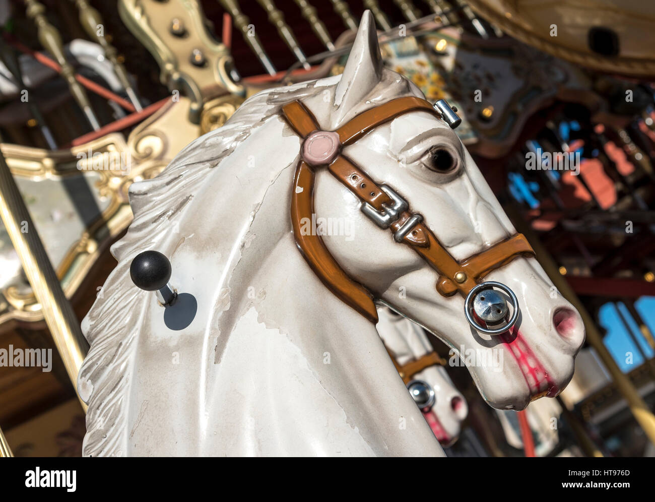 A worn and dirty white carousel horse head- Paris France. Stock Photo