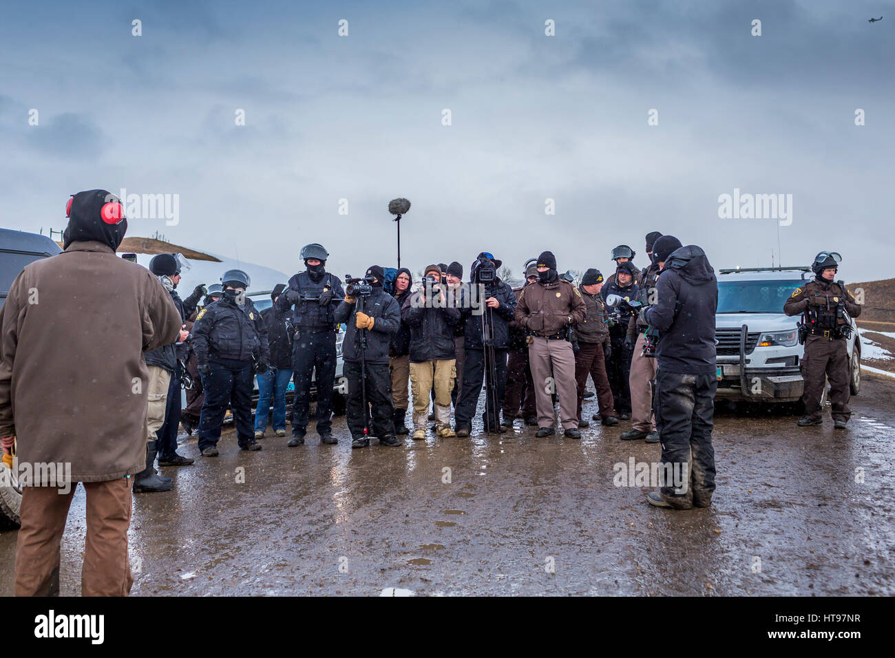Cannonball, United States. 22nd Feb, 2017. Defiant NoDAPL water protectors faced-off with various law enforcement agencies on the day the camp was slated to be raided on February 22, 2017. Credit: Michael Nigro/Pacific Press/Alamy Live News Stock Photo