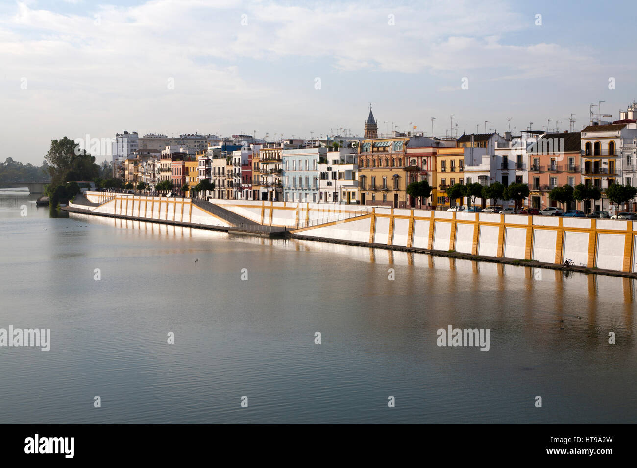 Historic houses on Calle Betis in the Triana district on the banks of the Guadalquivir river, Seville, Spain Stock Photo