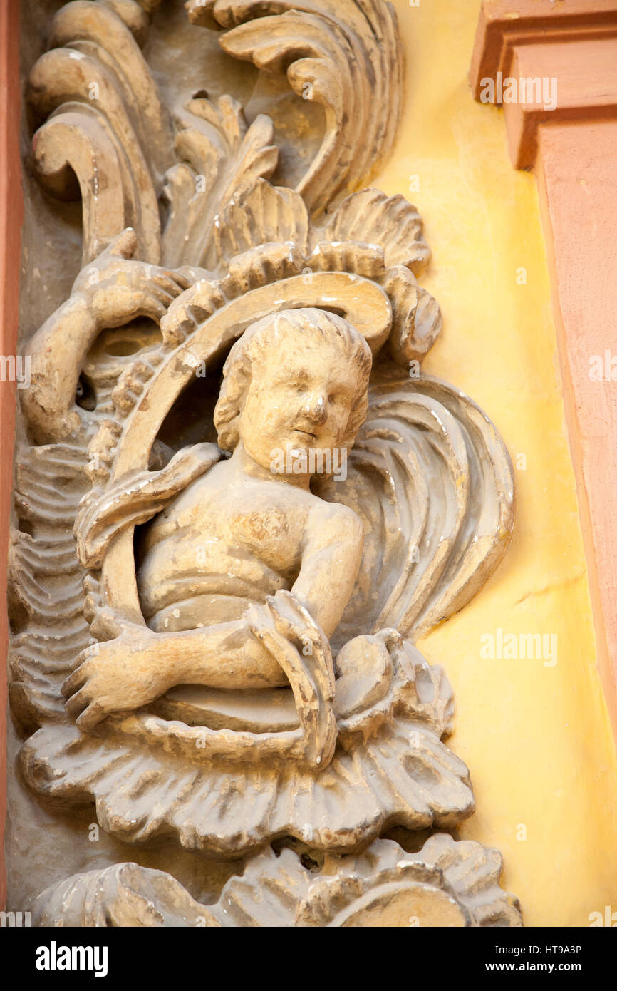 Carved stone cherub angel decoration, Alcazar palace, Seville, Spain Stock Photo