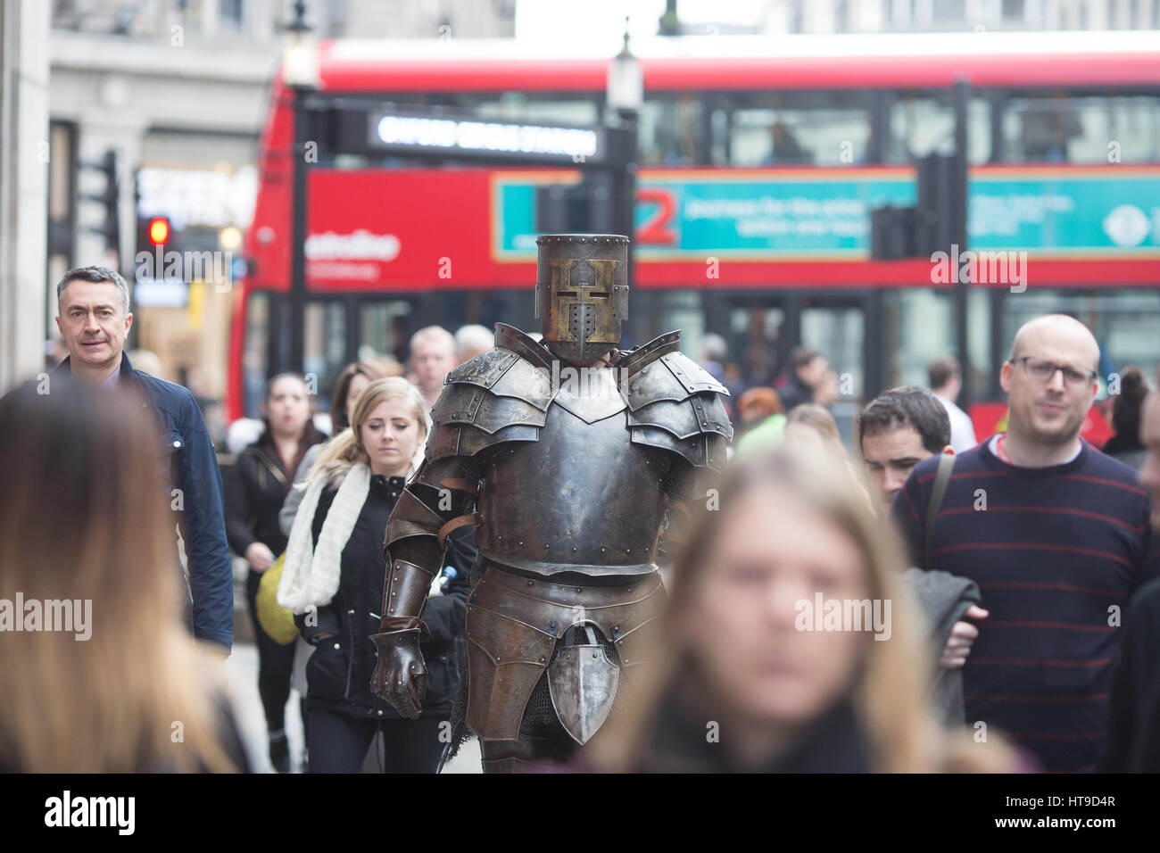 EDITORIAL USE ONLY A seven foot man dressed as a Knight in armour in Oxford Circus, London today as part of the HISTORY's A Big Knight In, which continues tonight with a new episode of Forged in Fire at 9pm. Stock Photo