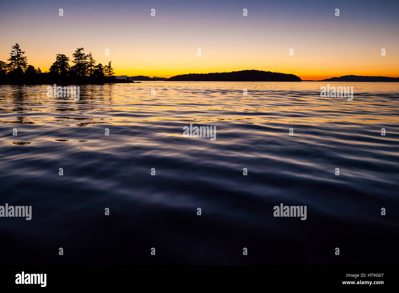 Sunset from the water in the San Juan Islands near Orcas Island, Washington, USA Stock Photo