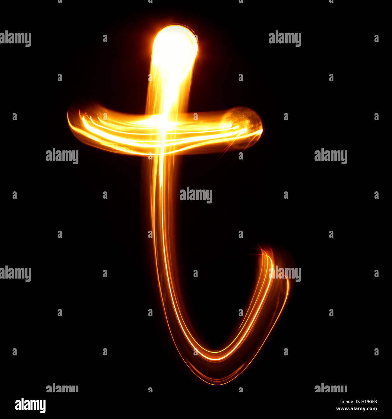 T - Created by light lowercase letters Stock Photo