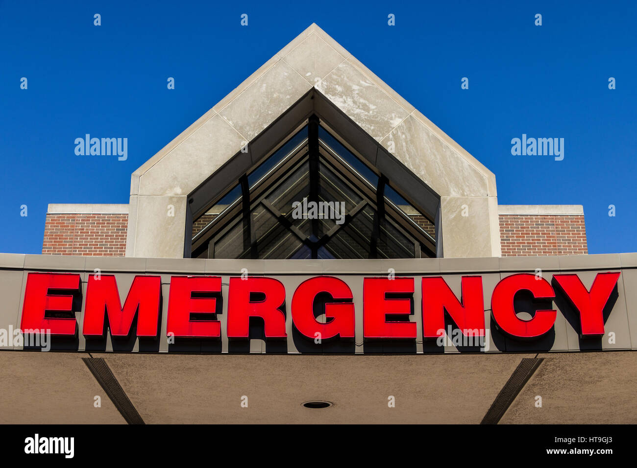 Red Emergency Entrance Sign for a Local Hospital XVII Stock Photo