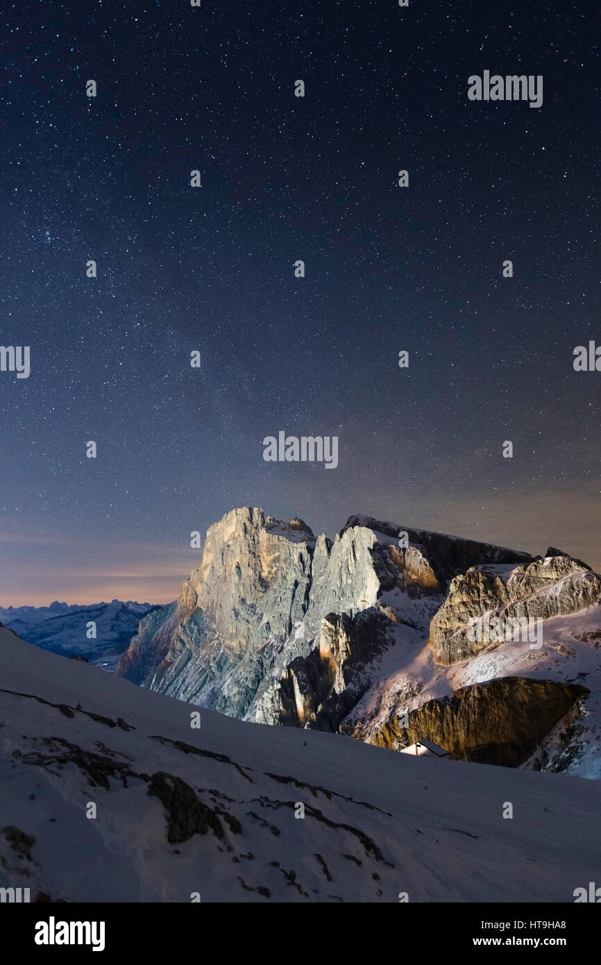 Cimon della Pala peak. The Pale di San Martino mountain group at night. Starry sky. The Dolomites of Trentino. Italian Alps. Europe. Stock Photo