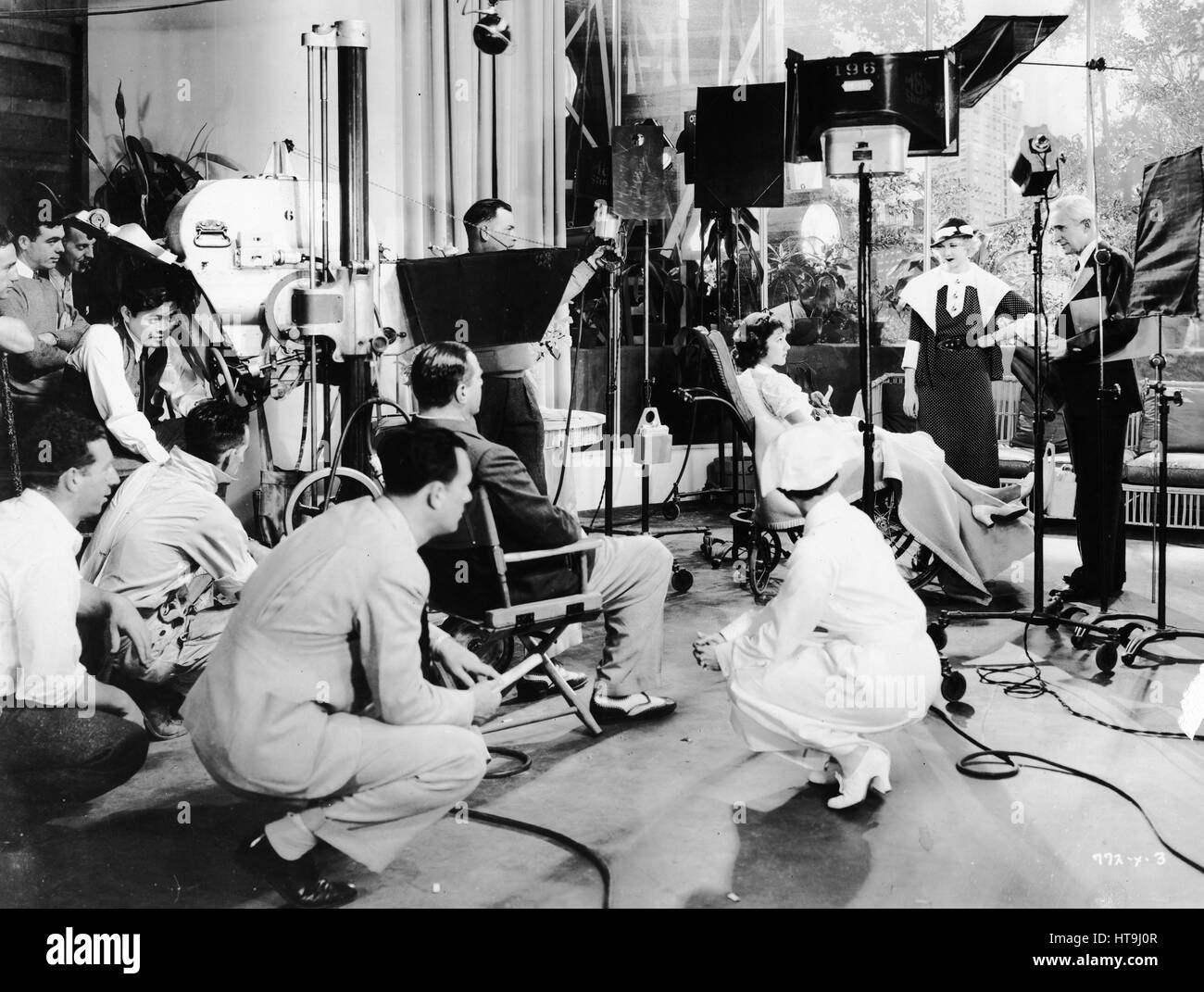 'An off-stage shot showing Una Merkel and Jean Parker being directed in a scene for the new Metro-Goldwyn-Mayer picture, 'Have a Heart,' which is being directed by David Butler.' Stock Photo