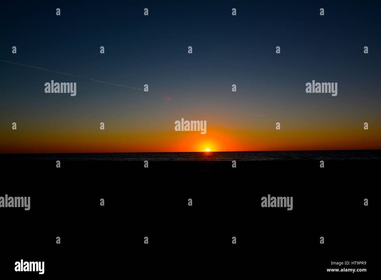 beautiful beach sunset Stock Photo - Alamy
