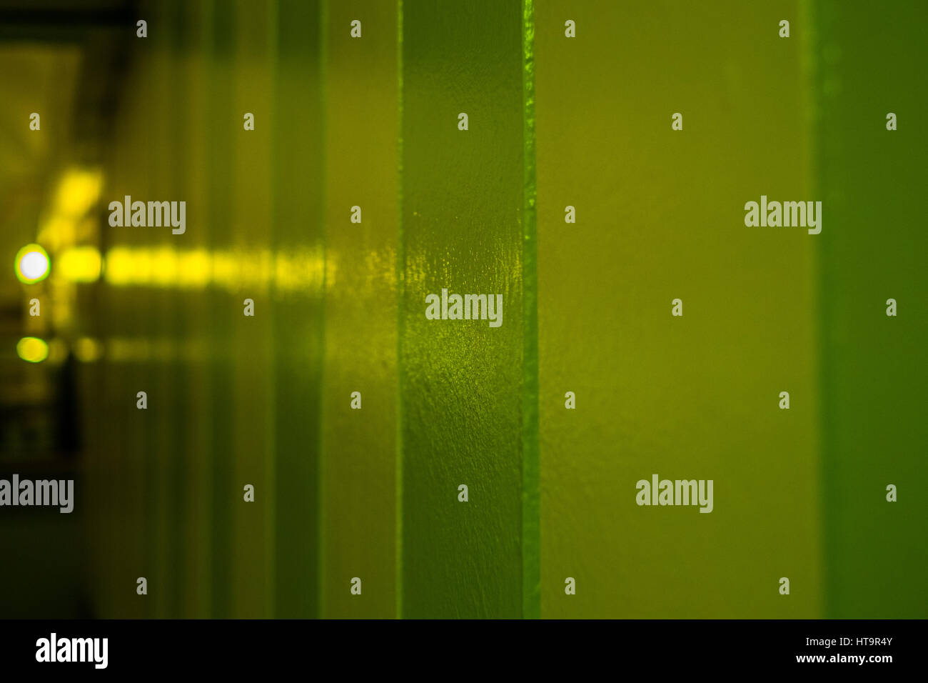 Yellow green wall with lights Stock Photo Alamy