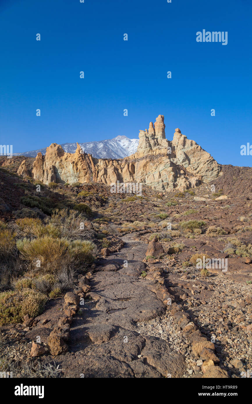 Looking towards El Teide Volcano on Tenerife with the Los Roques de Garcia in the foreground. Stock Photo