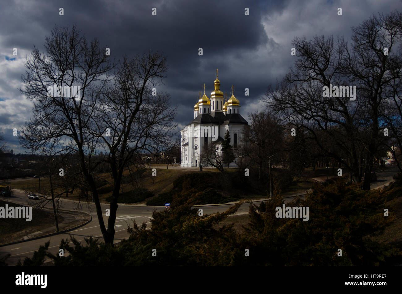 Catherine's Church, roadway around the hill, sunny cloudy day at early march, Chernigov, Ukraine Stock Photo