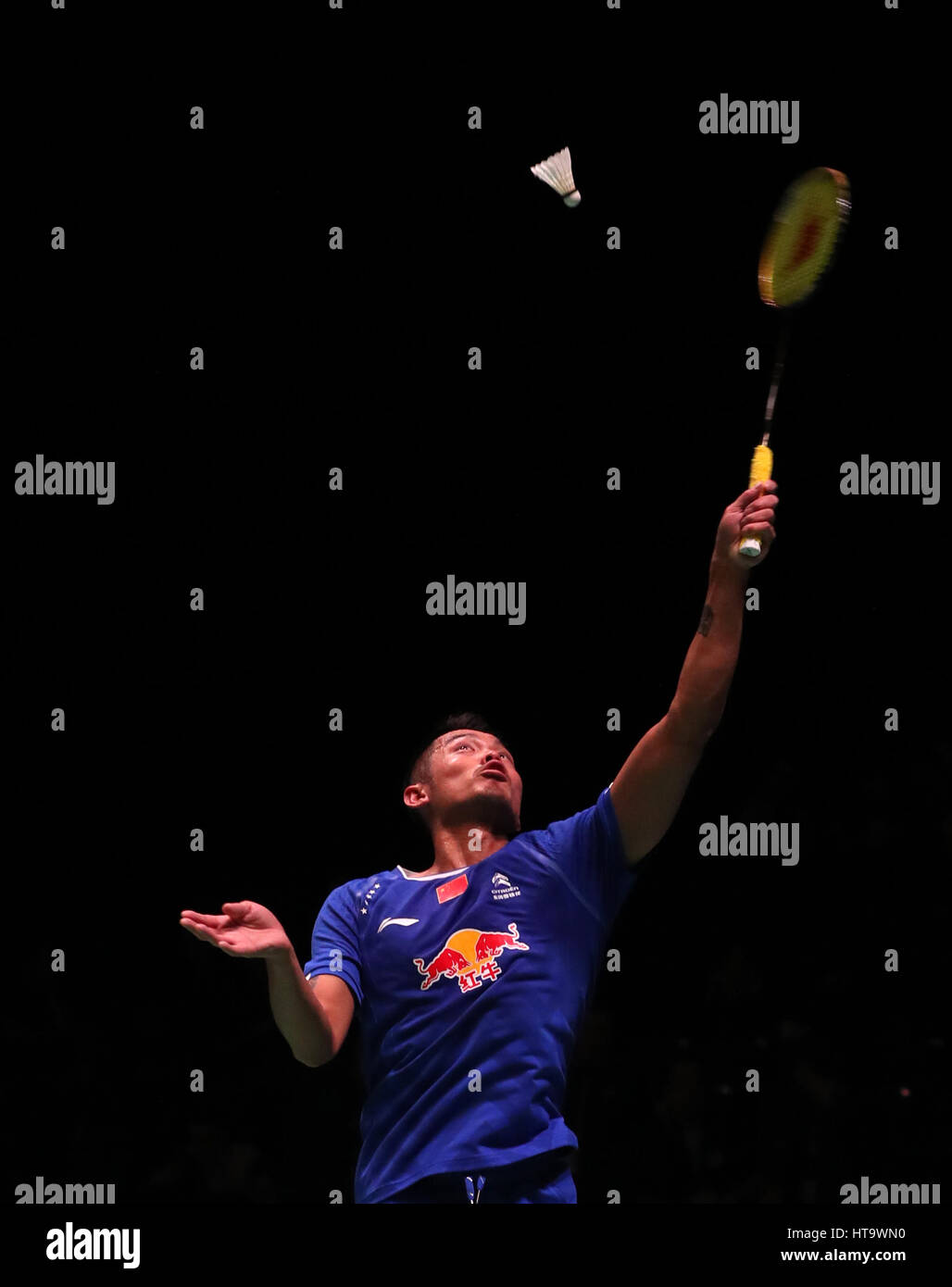 China's Lin Dan in action during his Women's singles match during day three of the YONEX All England Open Badminton Championships at the Barclaycard Arena, Birmingham. Stock Photo