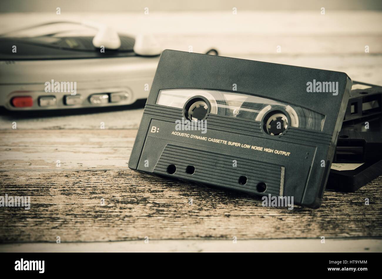 Old casette tape player. Retro style photo on wooden background Stock ...