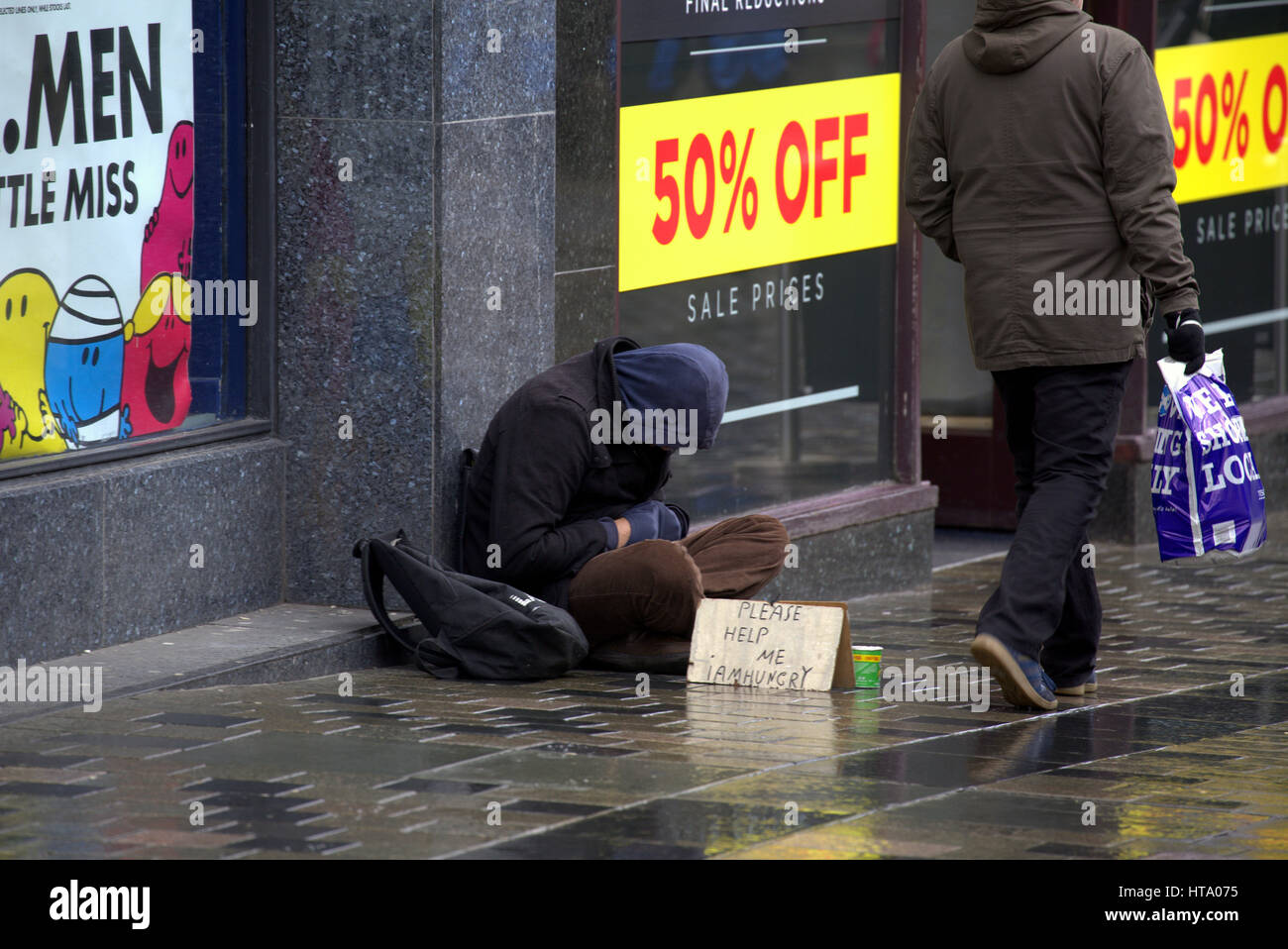 homeless in the uk begging on the street Stock Photo