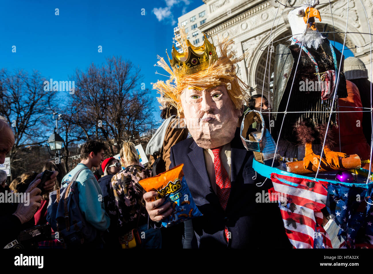New York, USA. 8th Mar, 2017 trump impersonator Elliot Crown dressed as King Trump as Women marked International Women's Day - A Day Without a Woman, with a rally in Washington Square Park followed by a march. Many women wore red and took the day off as a general strike. Credit: Stacy Walsh Rosenstock/Alamy Stock Photo