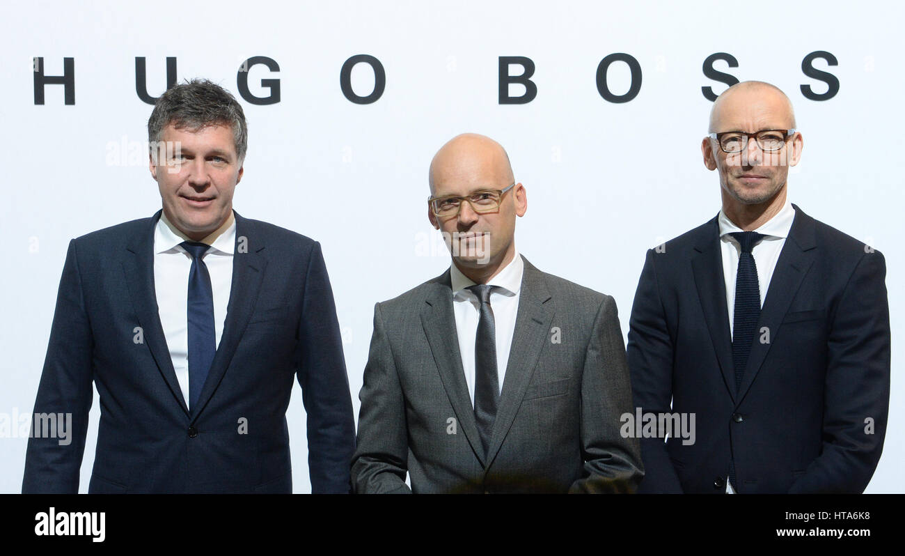 L-R: Director Bernd Hake, CEO Mark Langer, and brand manager and creative  director Ingo Wilts of Hugo Boss at a conference at which the fashion  house's annual financial report will be made
