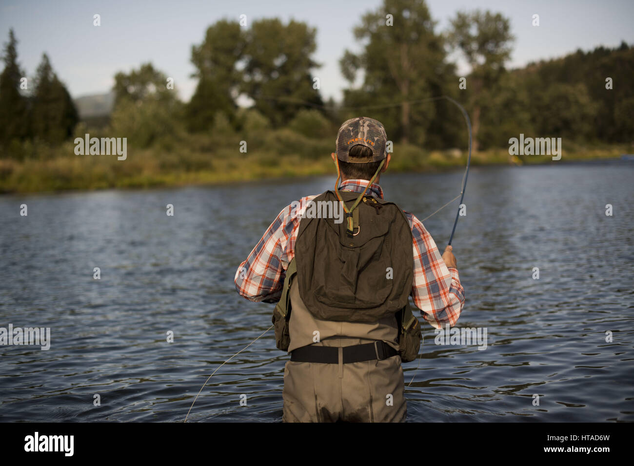 Idaho, USA. 7th Aug, 2016. Courtney Conklin and Jed Conklin flyfish for trout on the North Fork of the Coeur d'Alene River in North Idaho on a summer evening. Credit: Credit: /ZUMA Wire/Alamy Live News Stock Photo