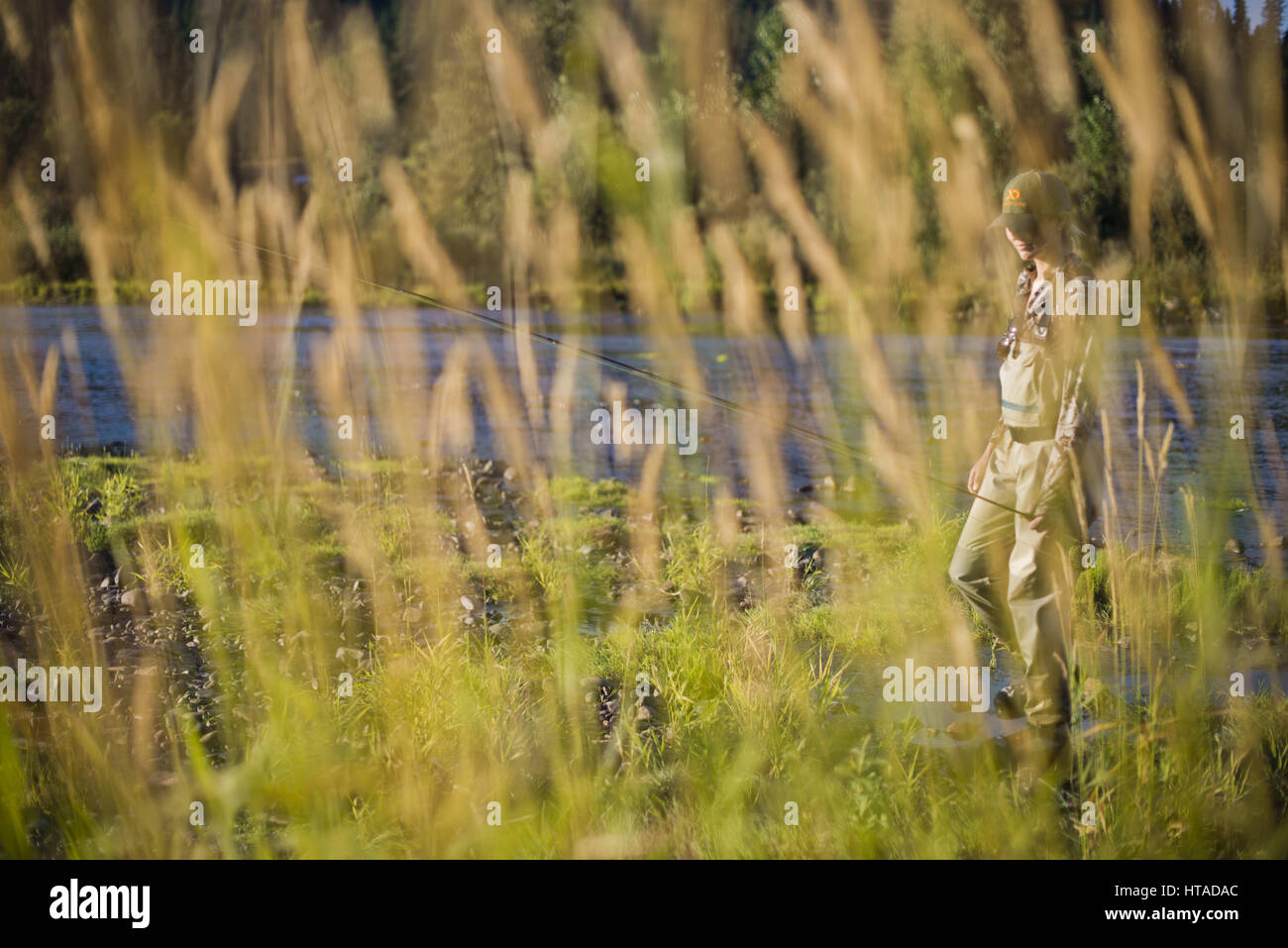 Idaho, USA. 7th Aug, 2016. Courtney Conklin and Jed Conklin flyfish for trout on the North Fork of the Coeur d'Alene River in North Idaho on a summer evening. Credit: Credit: /ZUMA Wire/Alamy Live News Stock Photo