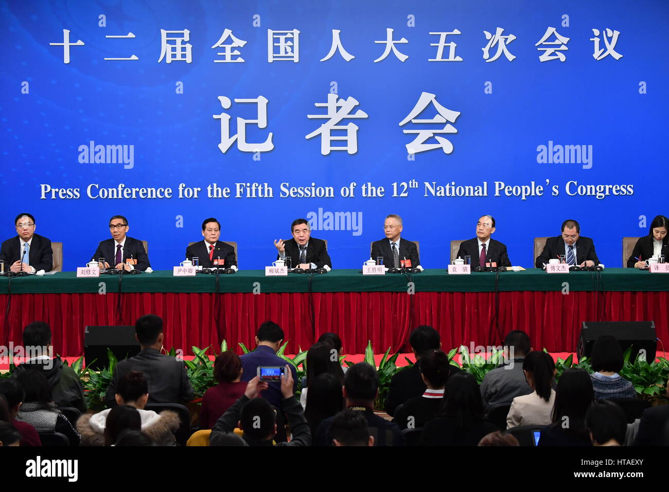 Beijing, China. 10th Mar, 2017. Liu Binjie, chairman of the Education, Science, Culture and Public Health Committee of the National People?s Congress (NPC), Wang Shengming, vice-chairman of Internal and Judicial Affairs Committee of the NPC, Yin Zhongqing, vice-chairman of Financial and Economic Affairs Committee of the NPC, Yuan Si, vice-chairman of the Environment Protection and Resources Conservation Committee of the NPC, Liu Xiuwen, deputy director of the Budgetary Affairs Commission of the NPC Standing Committee and Fu Wenjie, inspector of the Bureau of Secretaries of the Stock Photo